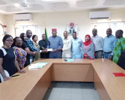 NIESV Abuja Branch Presents 10 Million Naira Cheque For National Building Secretariat